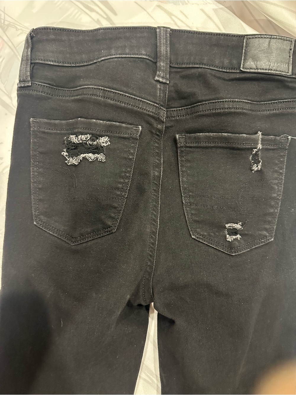 American Eagle Outfitters Black Skinny Jeans with Distressed front and back